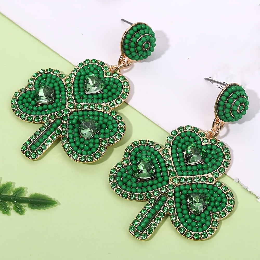 Celebrate St. Patrick's Day in style with these stunning Green Clover earrings adorned with handcrafted beaded rhinestones. Perfect for an Irish festival, this unique jewelry gift for women is made from high-quality Zinc Alloy and Stainless Steel in a