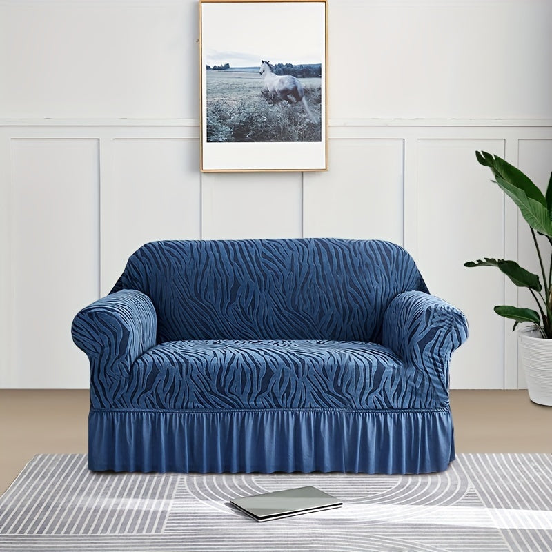 Wave pattern sofa slipcover with skirt, non-slip and dustproof. Protects furniture from cat scratches. Machine washable for easy cleaning. Suitable for bedroom, office, or living room décor.