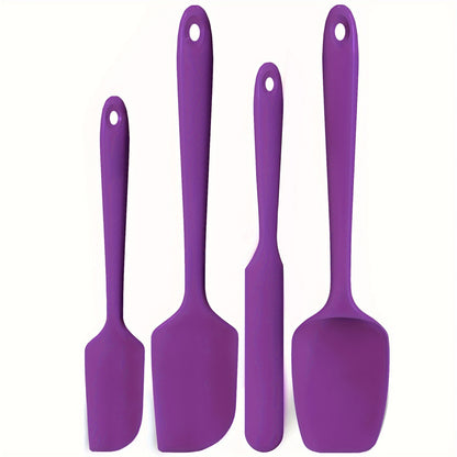 4-piece set of U-Taste heat resistant silicone spatulas for nonstick cookware, with a high temperature resistance of 600ºF and seamless, BPA-free design for safe food handling.