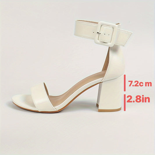 Stylish white open-toe sandals for women with ankle strap and chunky heel. Comfortable faux cover, all-season footwear. Versatile and elegant design. Features rubber sole and high heel.