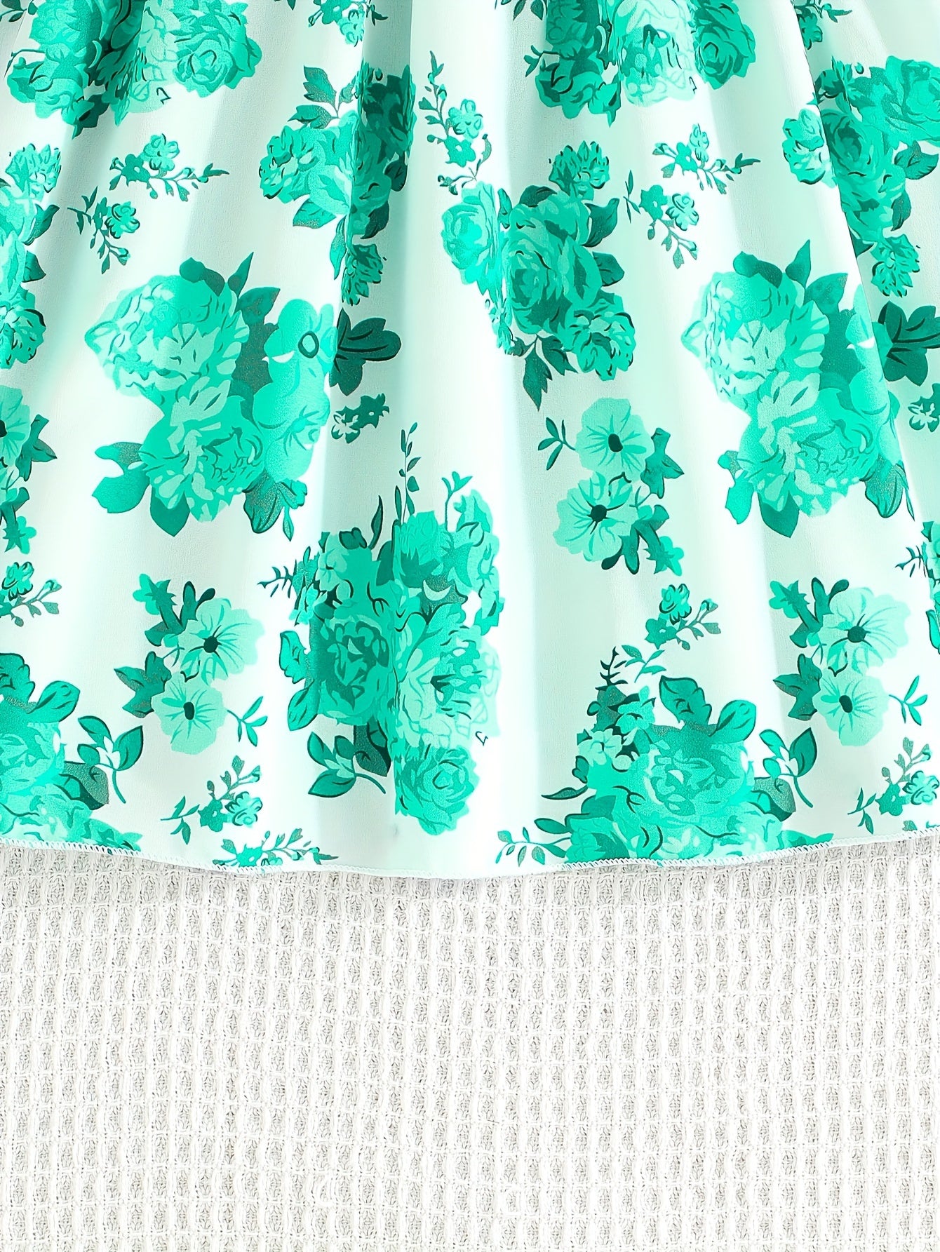 Floral-print cotton dress perfect for summer parties.