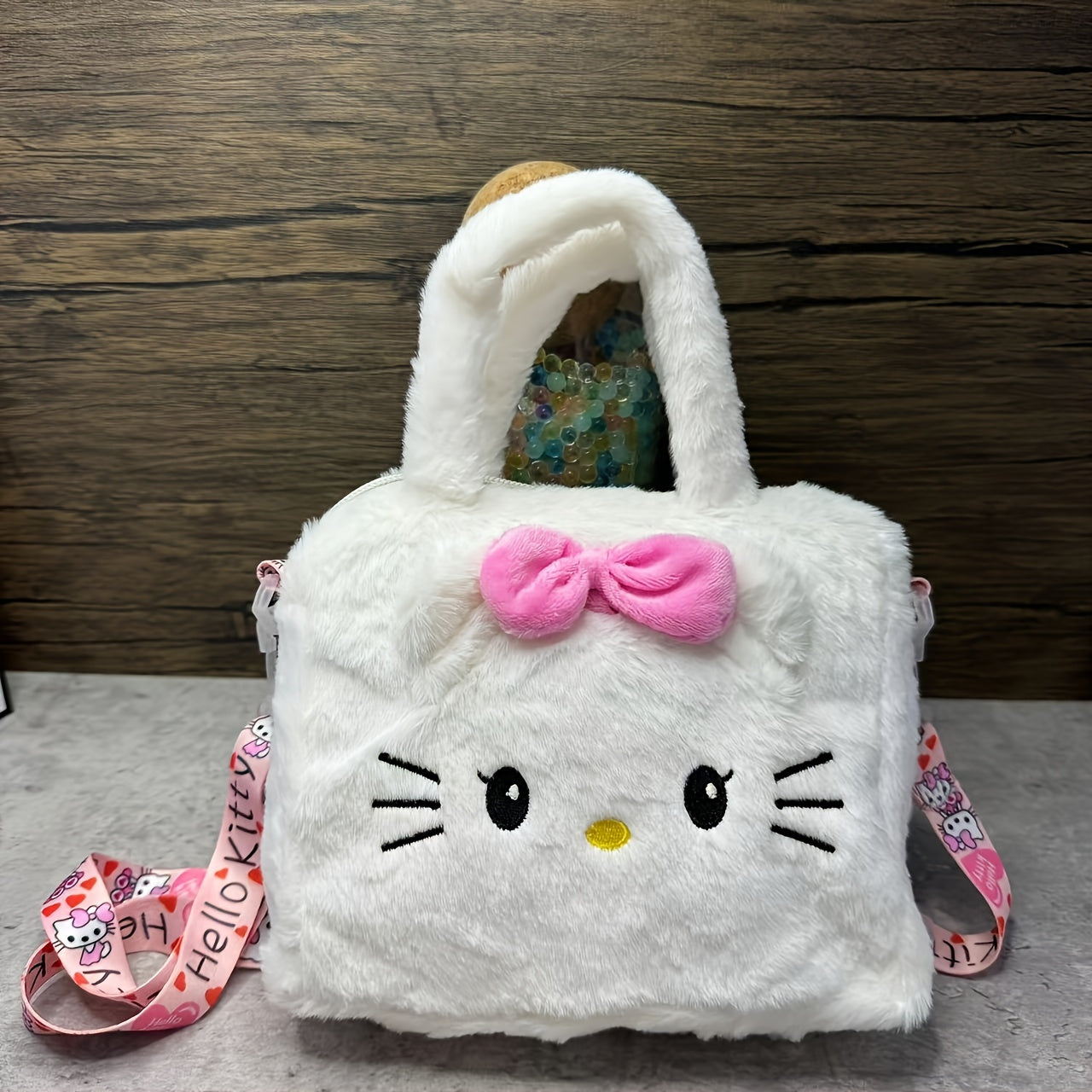 Sanrio plush handbags featuring Hello Kitty, Kuromi, and My Melody, as well as Kuromi Cinnamon Dog shoulder bag. Ideal for party and Valentine's Day gifts.