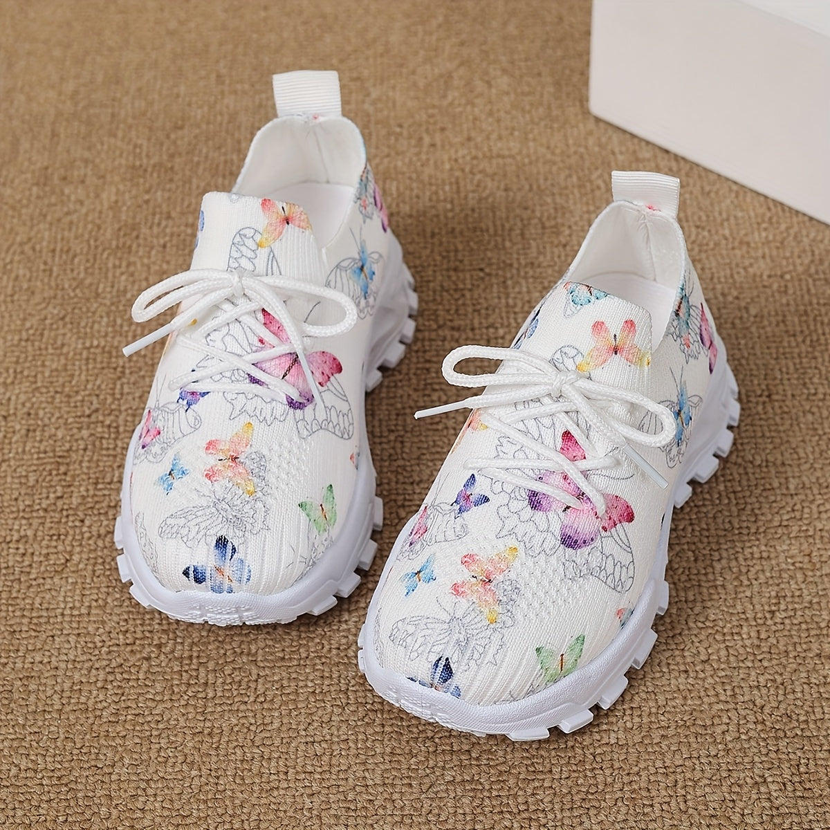 Stylish butterfly patterned running shoes for kids, with comfortable non-slip soles for outdoor sports.