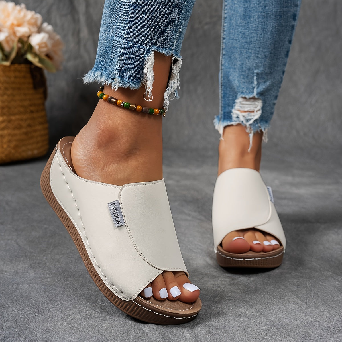 Comfortable slides with arch support and breathable design for stylish and versatile everyday wear.