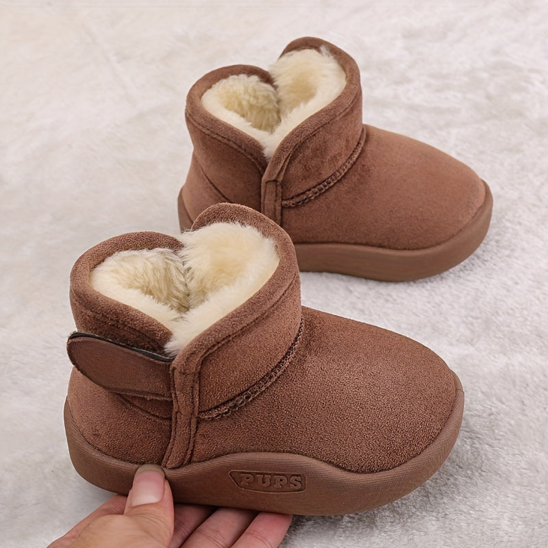 Children's soft-bottom snow boots for boys and girls, featuring magic tape closure and plus velvet lining for warmth and comfort.