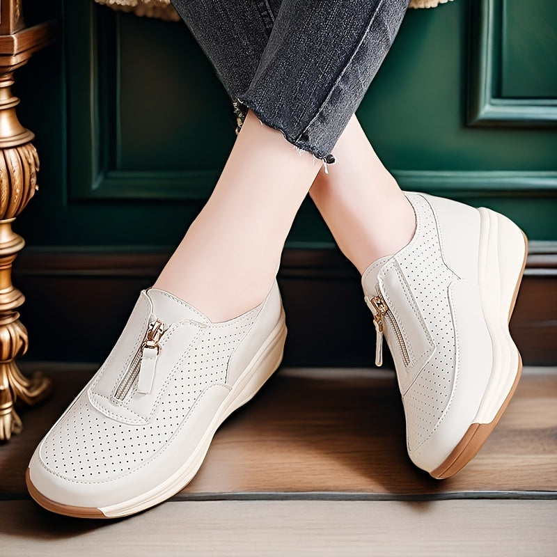 Beige perforated women's casual sneakers with zipper detail, thick sole, and anti-slip features.