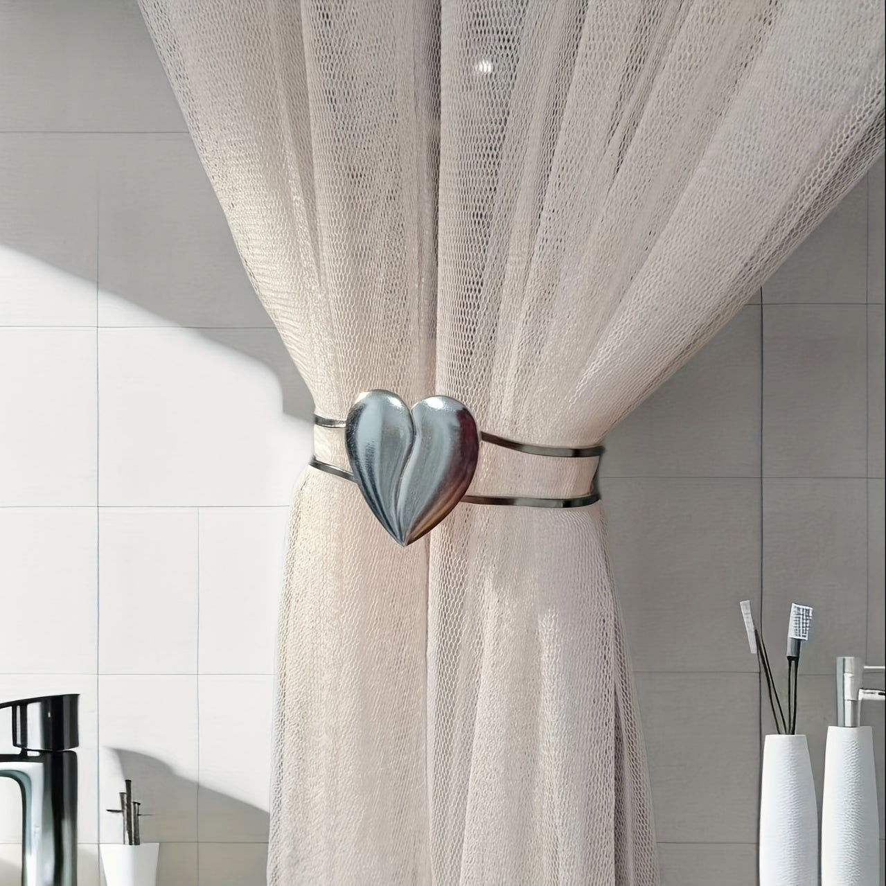 Heart-shaped decor curtain holder made of alloy, featuring a minimalist hollow design. Perfect for use in living rooms, offices, or homes as a stylish and functional curtain accessory.