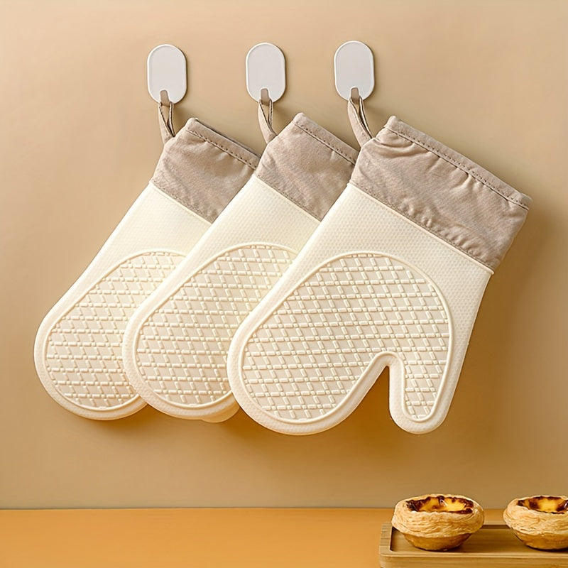 Two sets of silicone rubber gloves specially designed for heat resistance and anti-slip protection. These gloves feature two heat-resistant fingers for added dexterity, and are thickened for extra durability. Perfect for use in the kitchen oven while