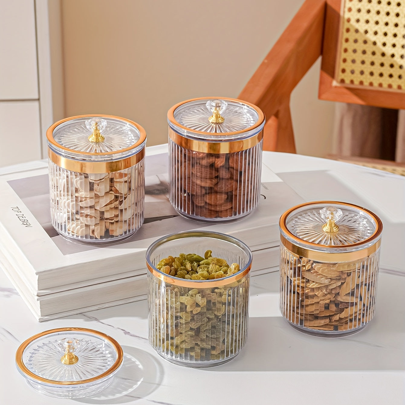 One piece of a transparent amber sketch golden grey bead decorated jar with a lid for candies. Made of plastic, can only be hand washed. It is a reusable sealed fresh-keeping box for storing cereal, rice, pasta, tea, nuts, and coffee beans. Perfect for