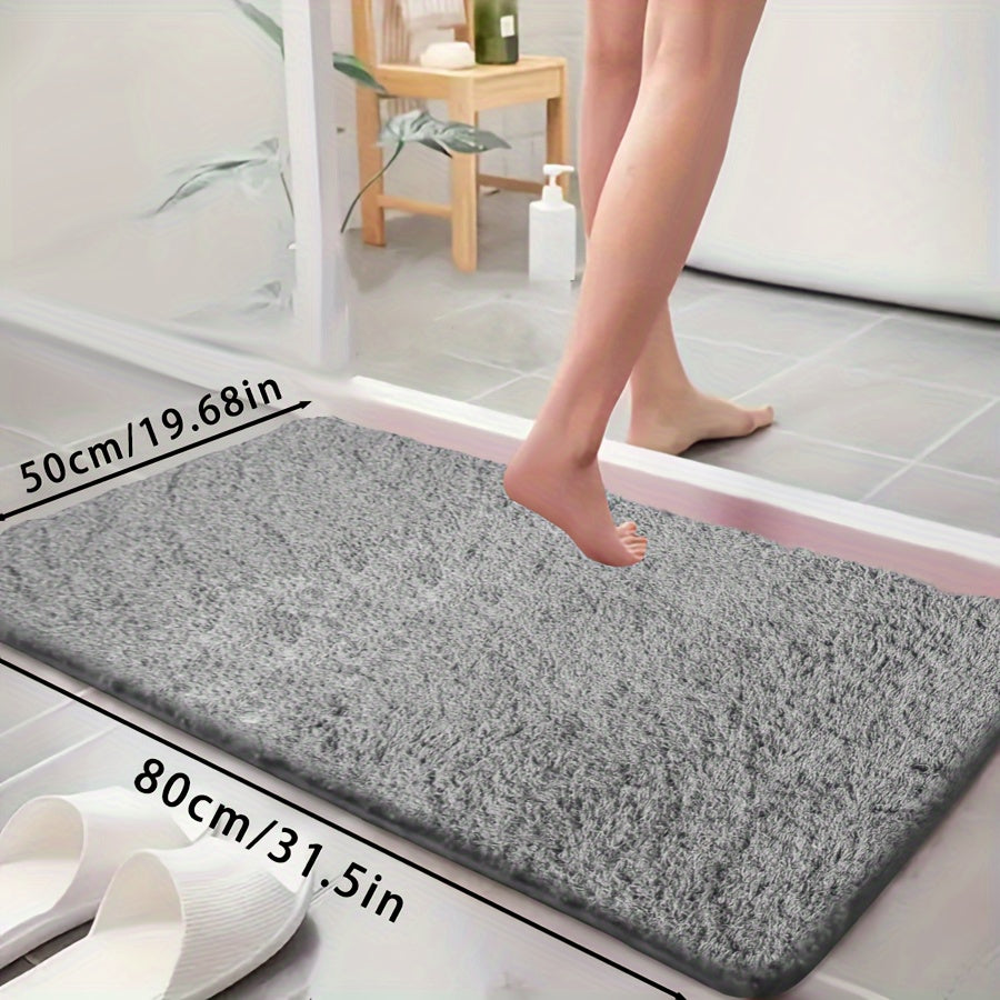 Ultra-soft bathtub mat with non-slip backing, absorbent and fade-resistant. Perfect for bathroom, laundry room, or entranceway.