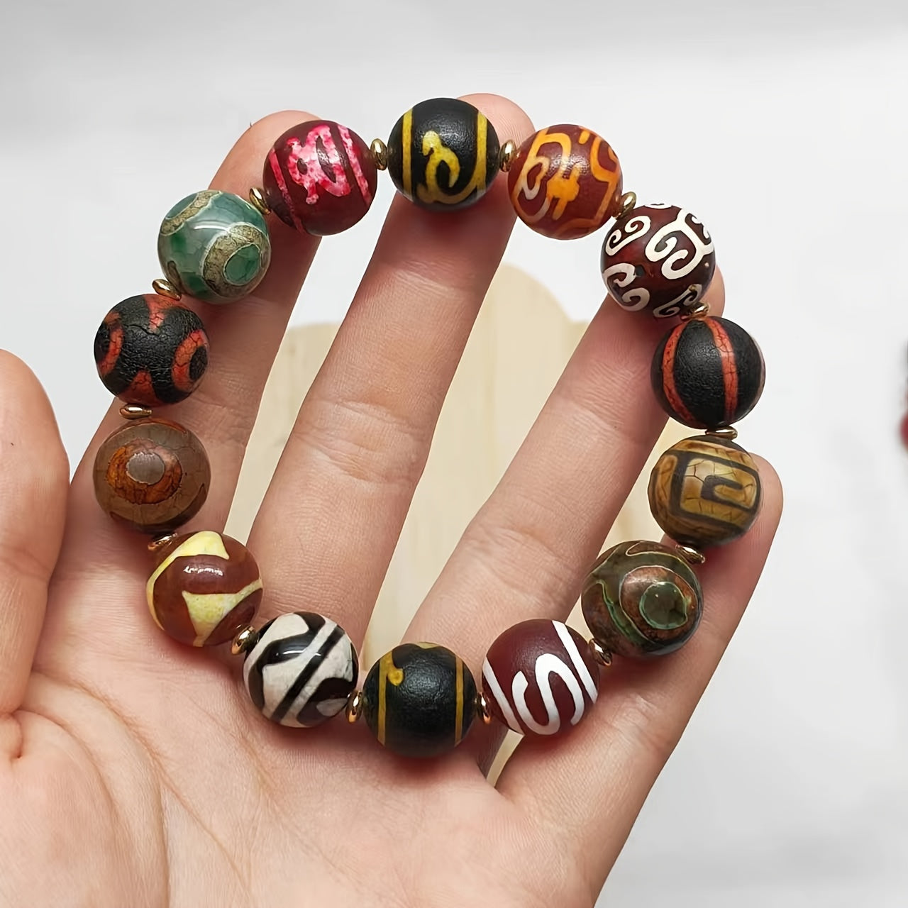 Unisex Stretch Gemstone Bracelet with Tibetan Dzi Beads in Traditional Tribal Chinese Style, Designed for Good Fortune and Peace. A Versatile and Stylish Daily Accessory, Perfect for Men and Women, Makes a Great Gift for Any Occasion.