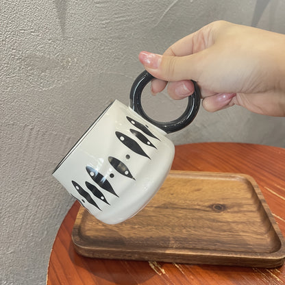 Stylish black and white checkered ceramic coffee mug - Ideal for home or restaurant use.