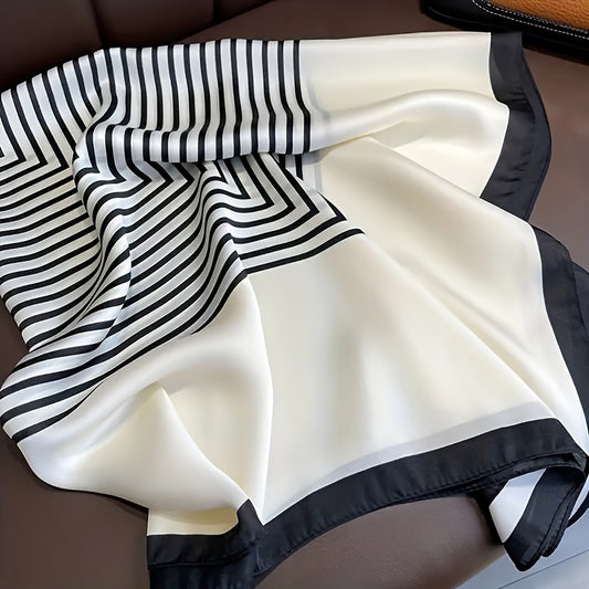 Elegant 89.92cm black and white striped satin square scarf for women. Perfect for evening outings and adding a sophisticated touch to your outfit. Soft polyester fabric with pompom detail