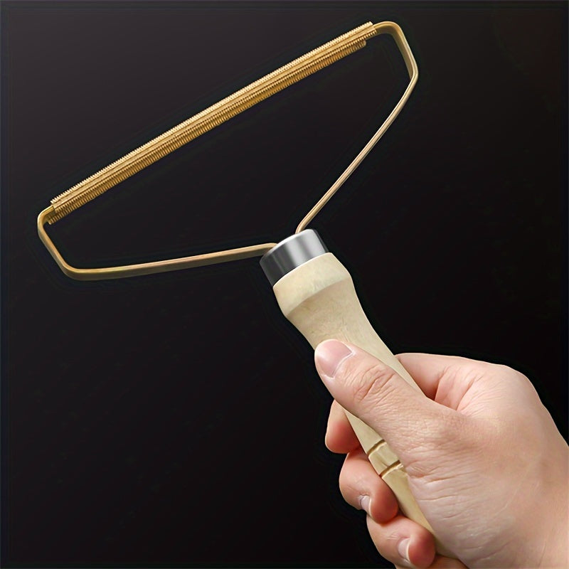 Pet hair remover tool with metal blade for cleaning carpets, clothing, and upholstery.