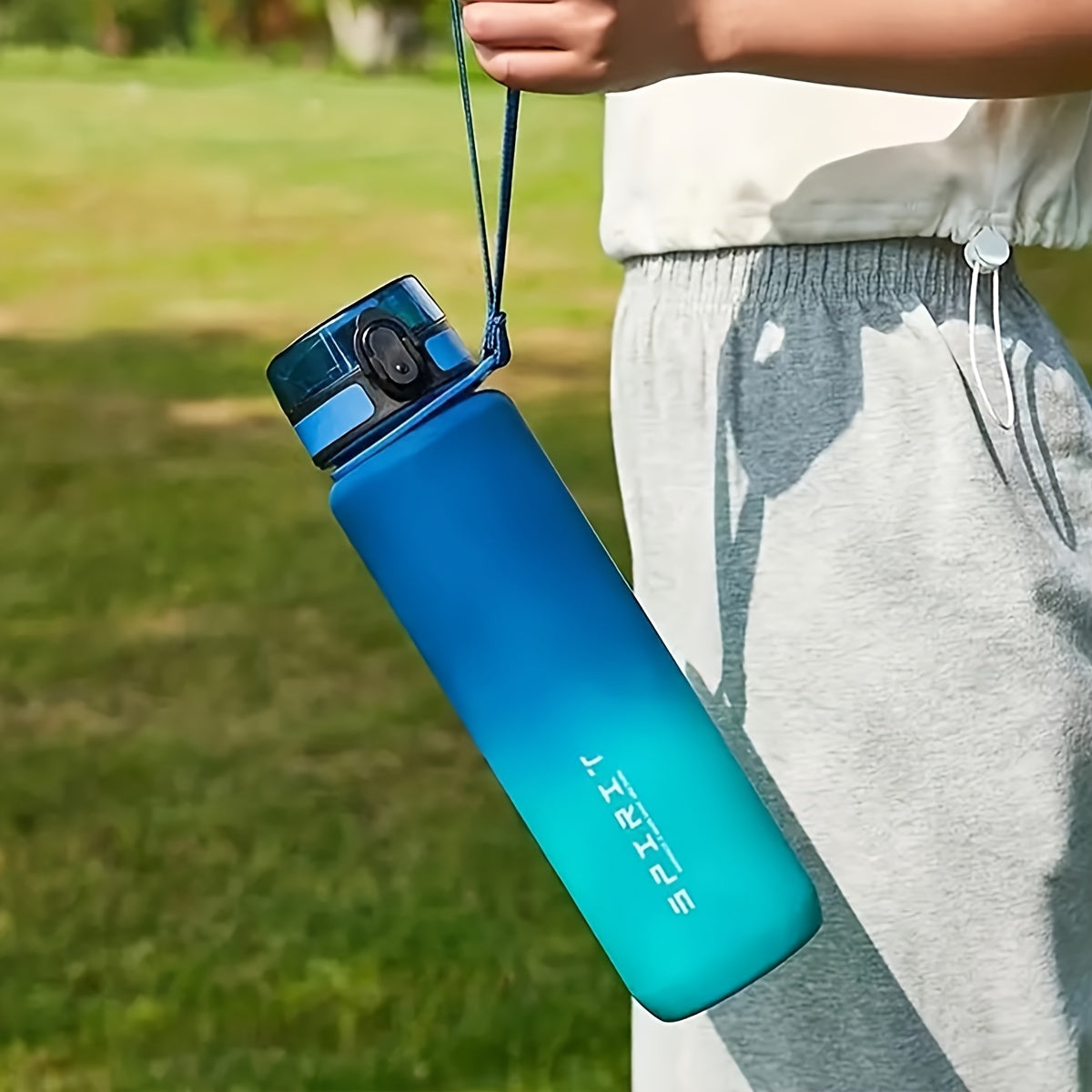 Portable Gradient Sports Water Bottle in 26oz or 10.5oz sizes, leakproof, dishwasher safe for outdoor use.