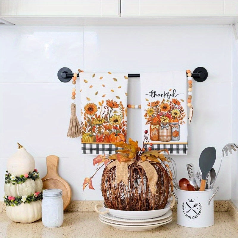 Set of 2 Kitchen Towels measuring 45.72*66.04 cm featuring Autumn pumpkin elements for home decor. These towels are reusable and perfect for adding a touch of individuality to your kitchen or party decorations. They also make a great holiday gift, with