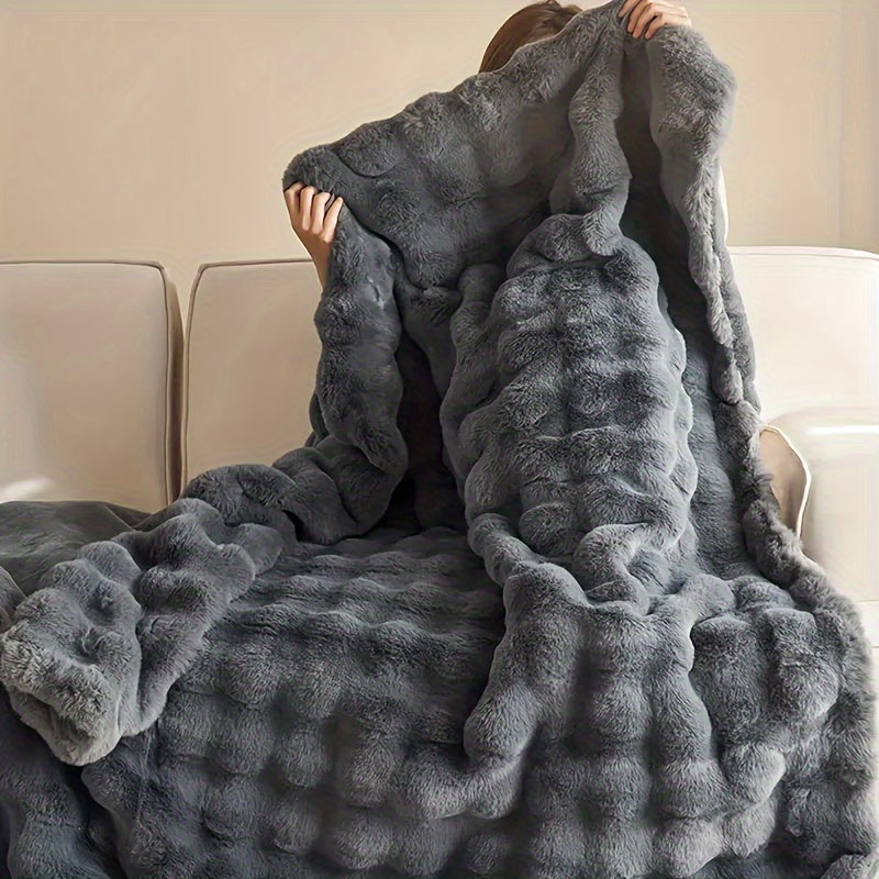 Get cozy with this versatile 1pc Double-sided Rabbit Fleece Blanket. Made with soft faux fur plush material, this solid color blanket is perfect for keeping warm on the couch, sofa, office, bed, camping, or travel. It also makes a great multi-purpose