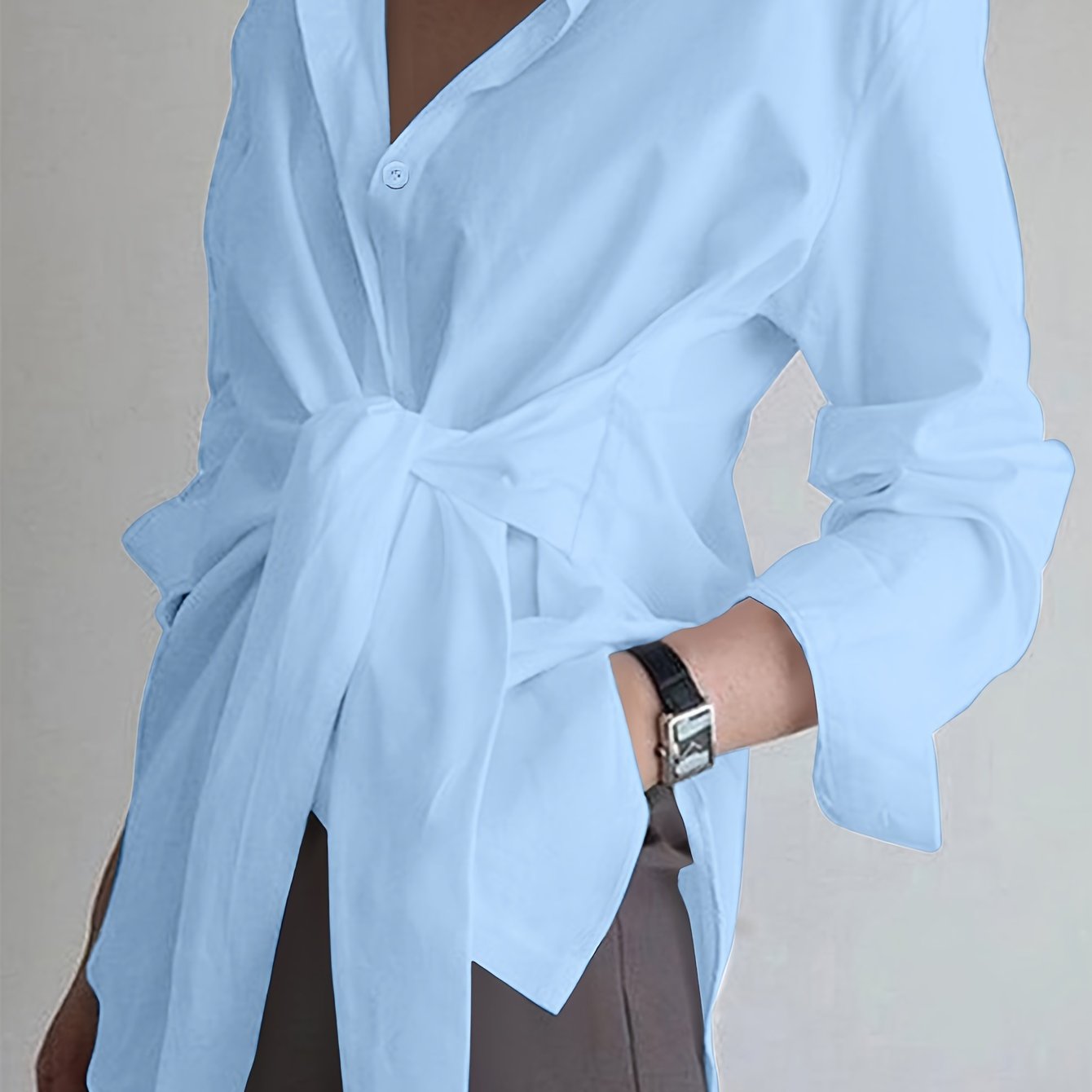 Lapel collar women's shirt made of 100% polyester with long sleeves and button front. All-season woven fabric, 117 gsm weight - versatile for adults.