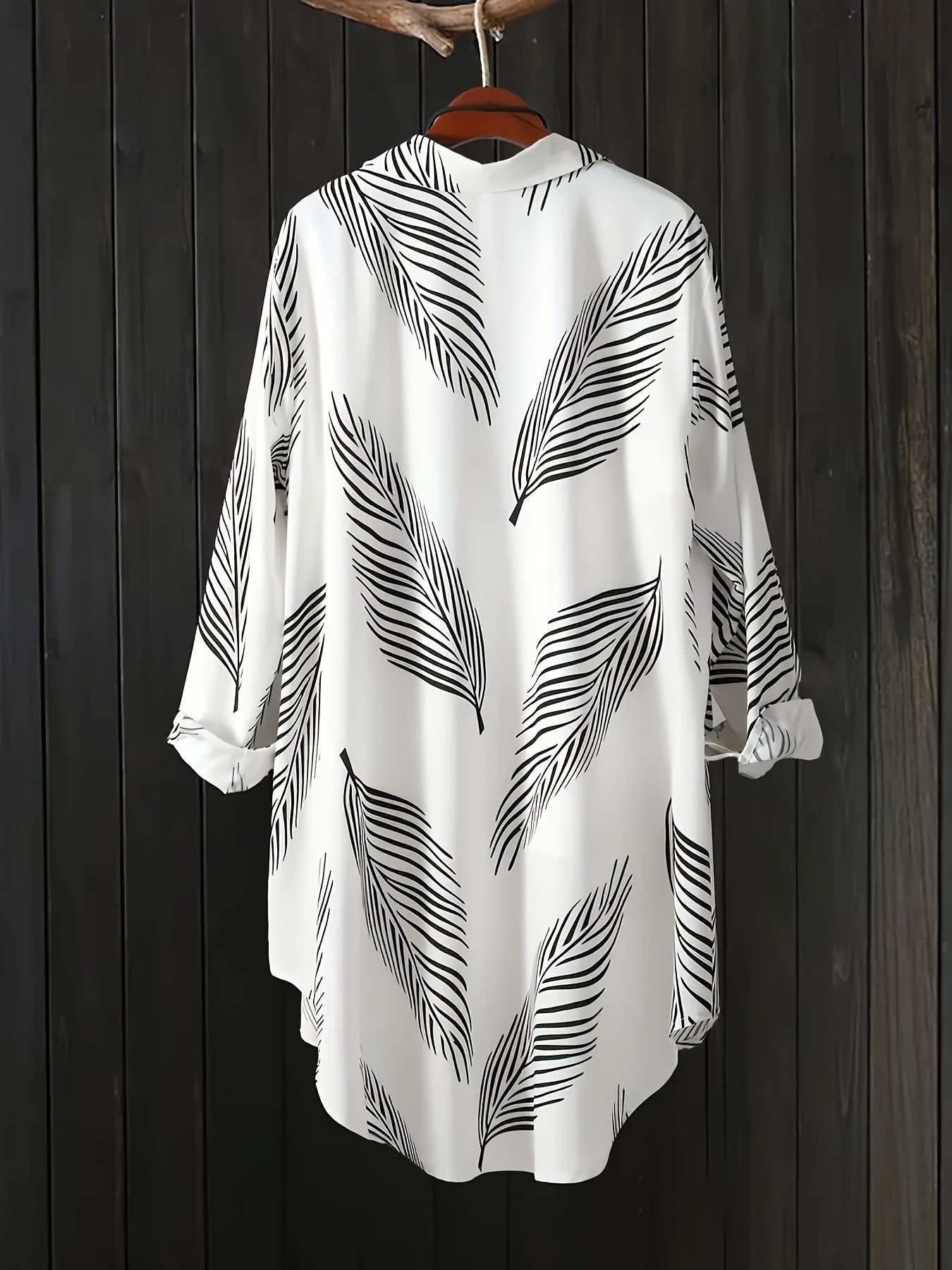 Printed button-up shirt with high-low hem and rolled sleeves, women's plus size.