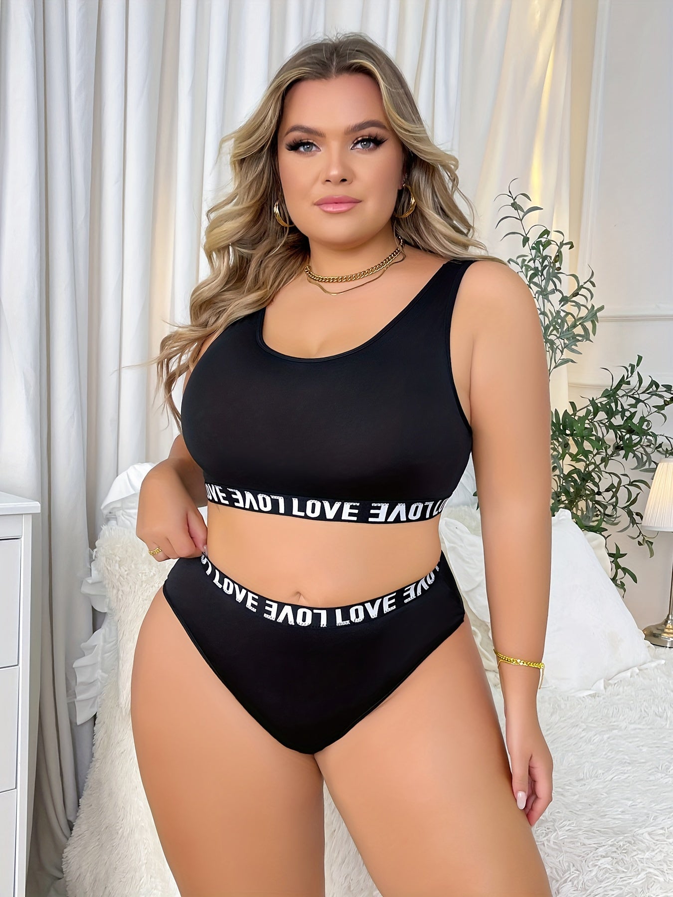 Women's plus size simple lingerie set includes a seamless bra and panty with contrast letter tape.