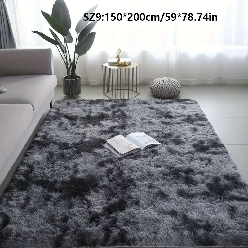 Long fleece carpet in a dark grey tie dye gradient, perfect for the living room coffee table or bedroom decor. This washable mat is fully padded and makes a great Halloween or Christmas gift.