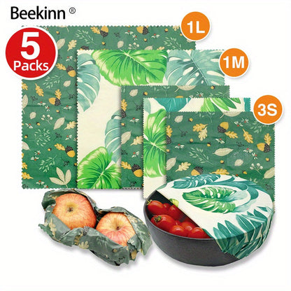 A 5-piece collection of eco-friendly Beeswax Food Wraps - Perfect for wrapping cheese, fruit, bread, snacks and more. These reusable wraps are non-stick and ideal for storing food in your kitchen pantry or refrigerator.