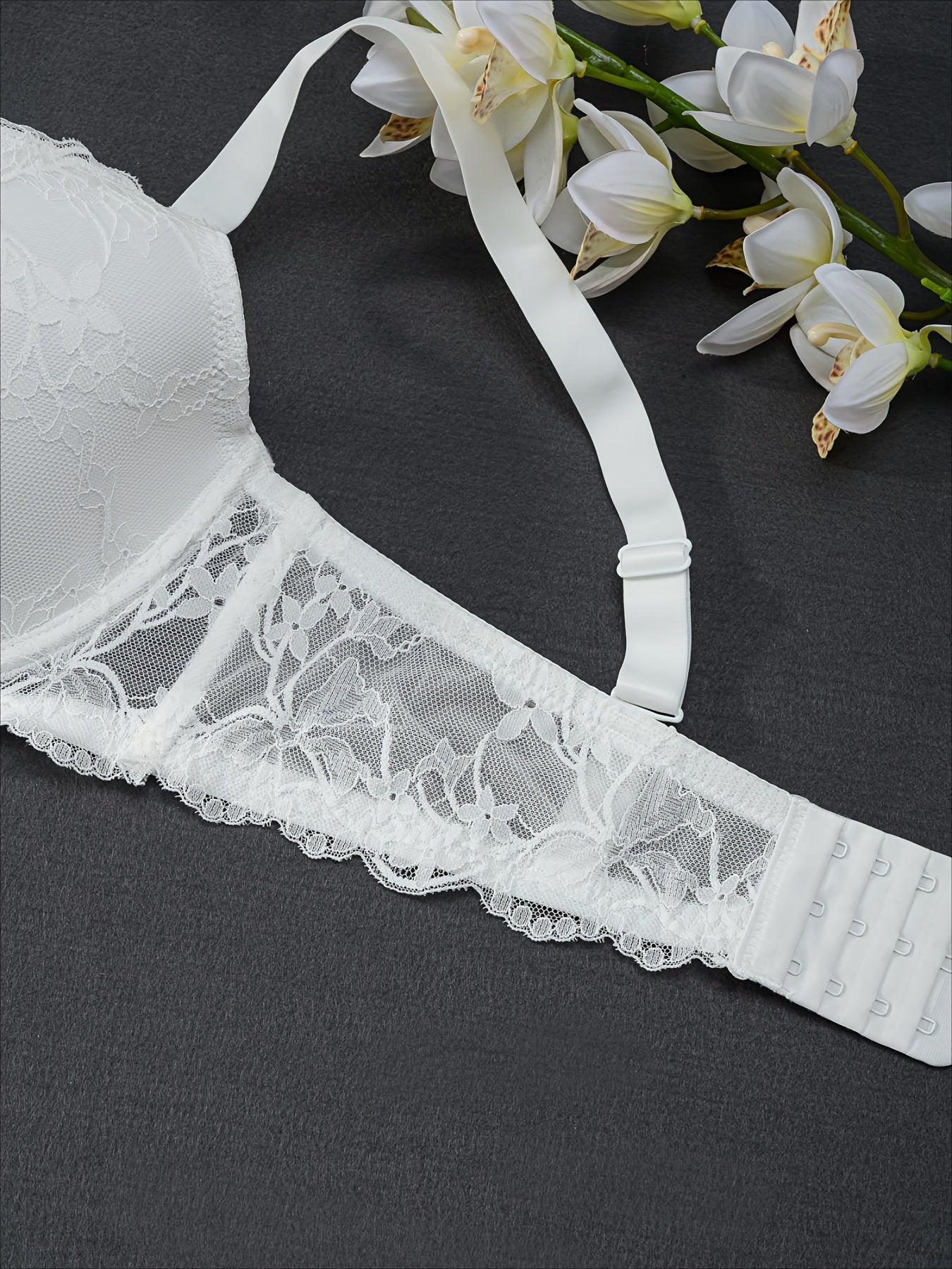 Elegant floral lace underwire bra for plus-size women with bow decor.