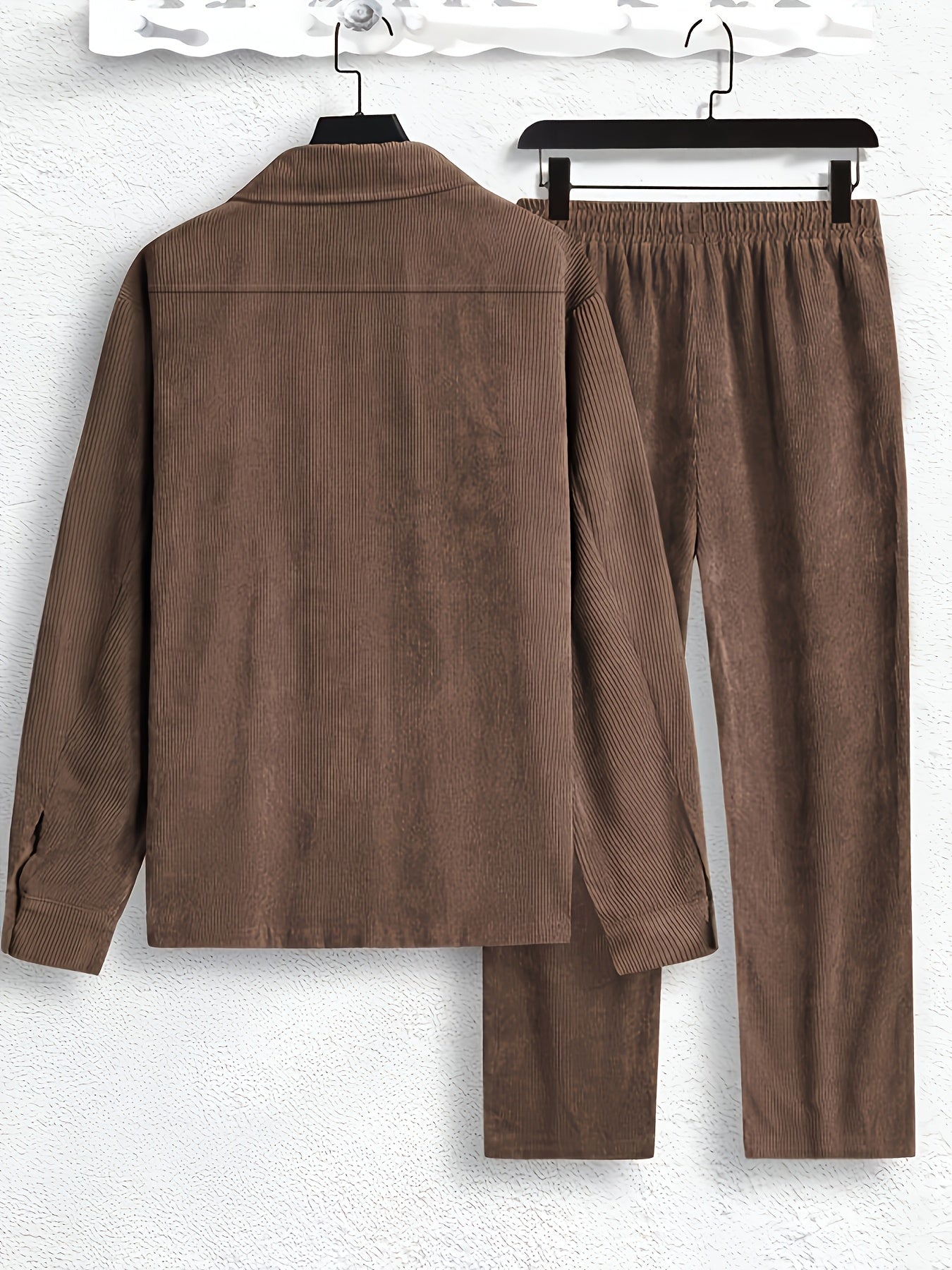 OBM Men's Casual Set includes a solid brown jacket and pants made of machine washable, non-stretch polyester fabric. Ideal for outdoor leisure activities in fall/winter. Unreviewed.