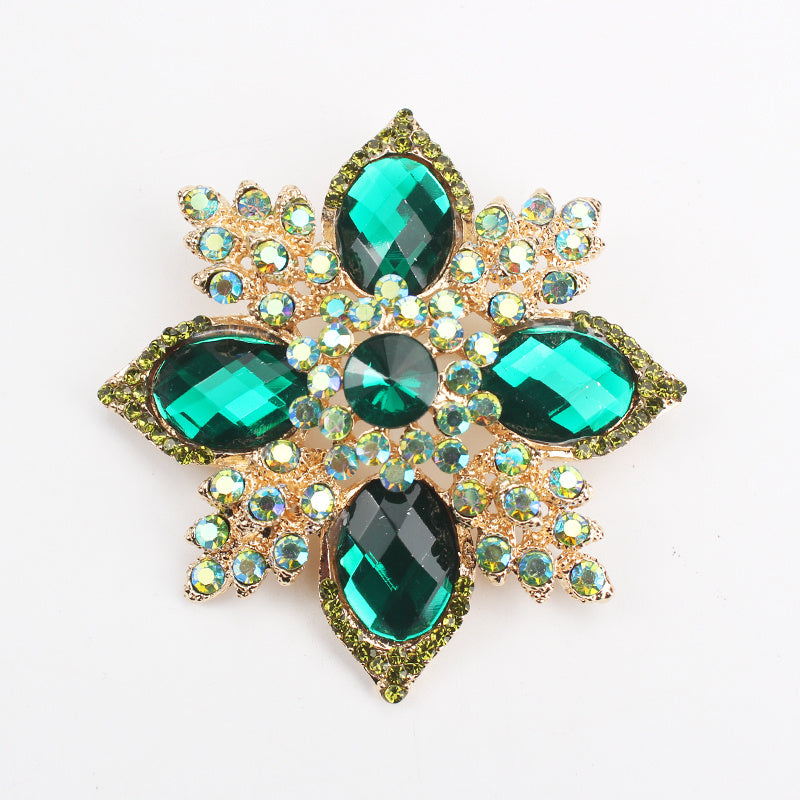 Luxurious Fashion Accessory: Vintage Green Rhinestone Flower Brooch with Baroque Elegance, Quadrangular Cross Design, and Irregular Shape