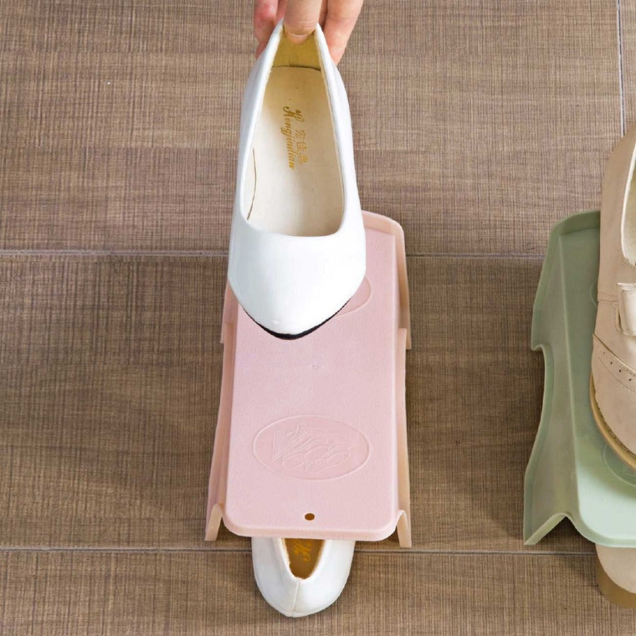 Plastic Shoe Storage Shelf with Two Tiers for Neatly Organizing Footwear in Your Closet.