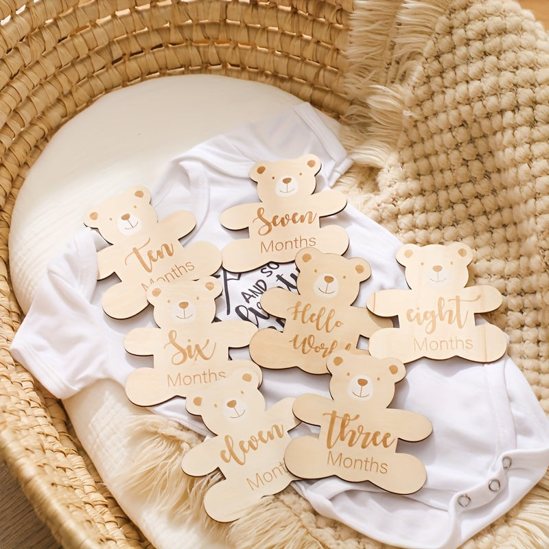 Wooden birthday lettering, growth milestone cards, sweet bear accents, wooden milestone cards, adorable photo props, baby's first birthday celebration.