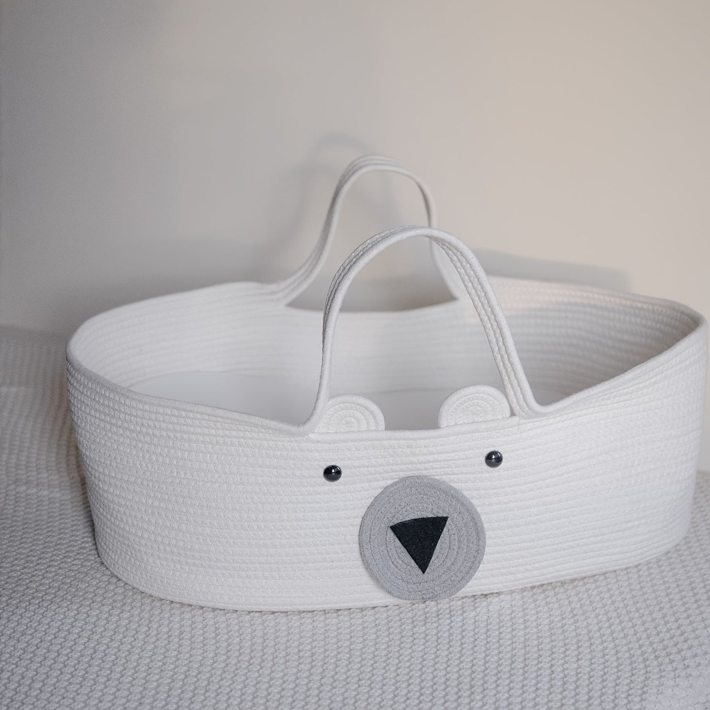 The LA DEARCHUU Portable Baby Crib features a charming Bear Design and a Foldable Fabric Cradle. It also includes a Multifunctional Weaving Storage Basket in Beige/Khaki. This product does not require batteries and is suitable for Newborns up to 3 years