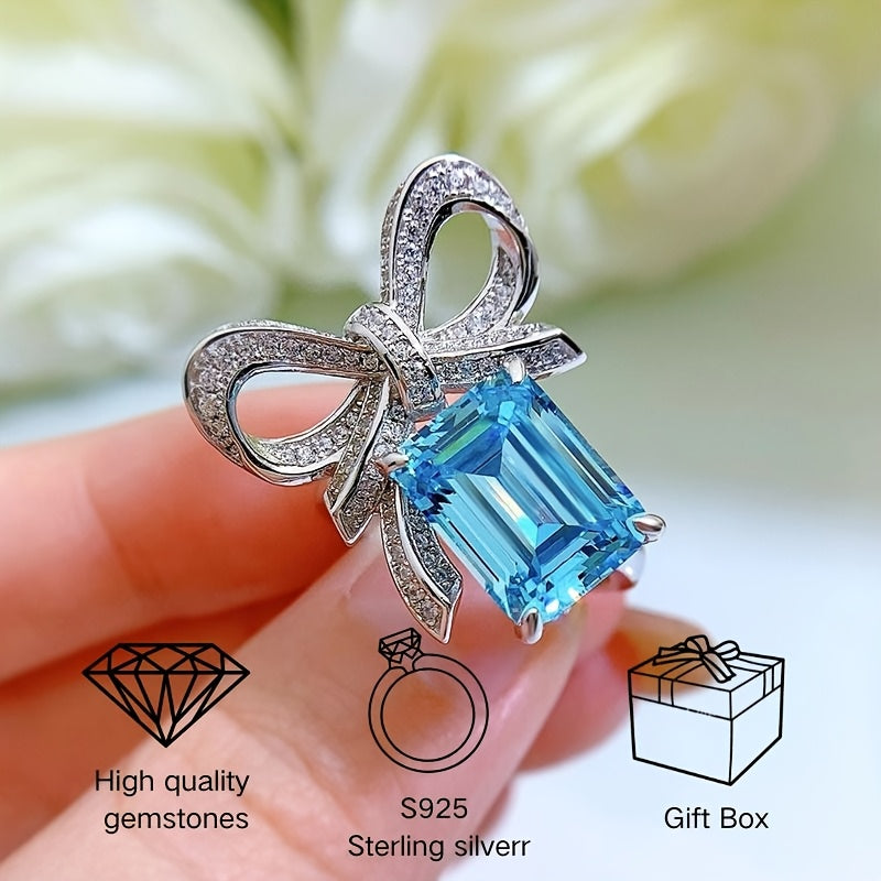 New for 2024, this stunning butterfly ring features a 9*12 aquamarine stone set in high carbon silver. Perfect for a female recipient, this ring comes in a random gift box style.