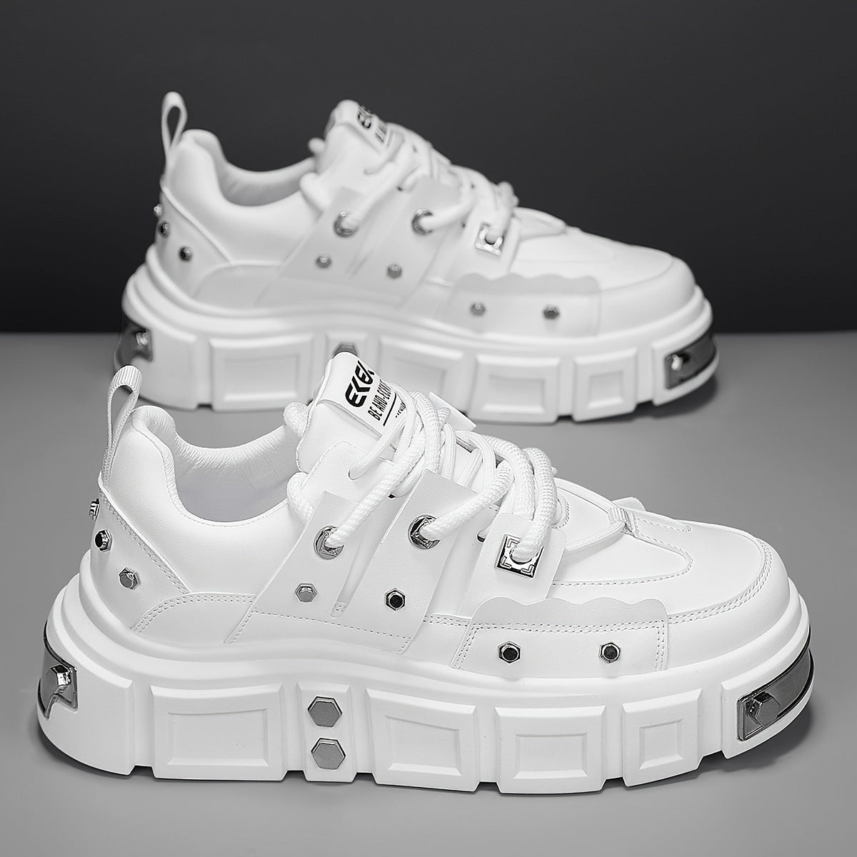 Chunky, punk-inspired sneakers with metal stud accents. Streetwear fashion statement in white, thick-soled trainers. Ideal for skateboarding, parties, and everyday wear. Unisex.