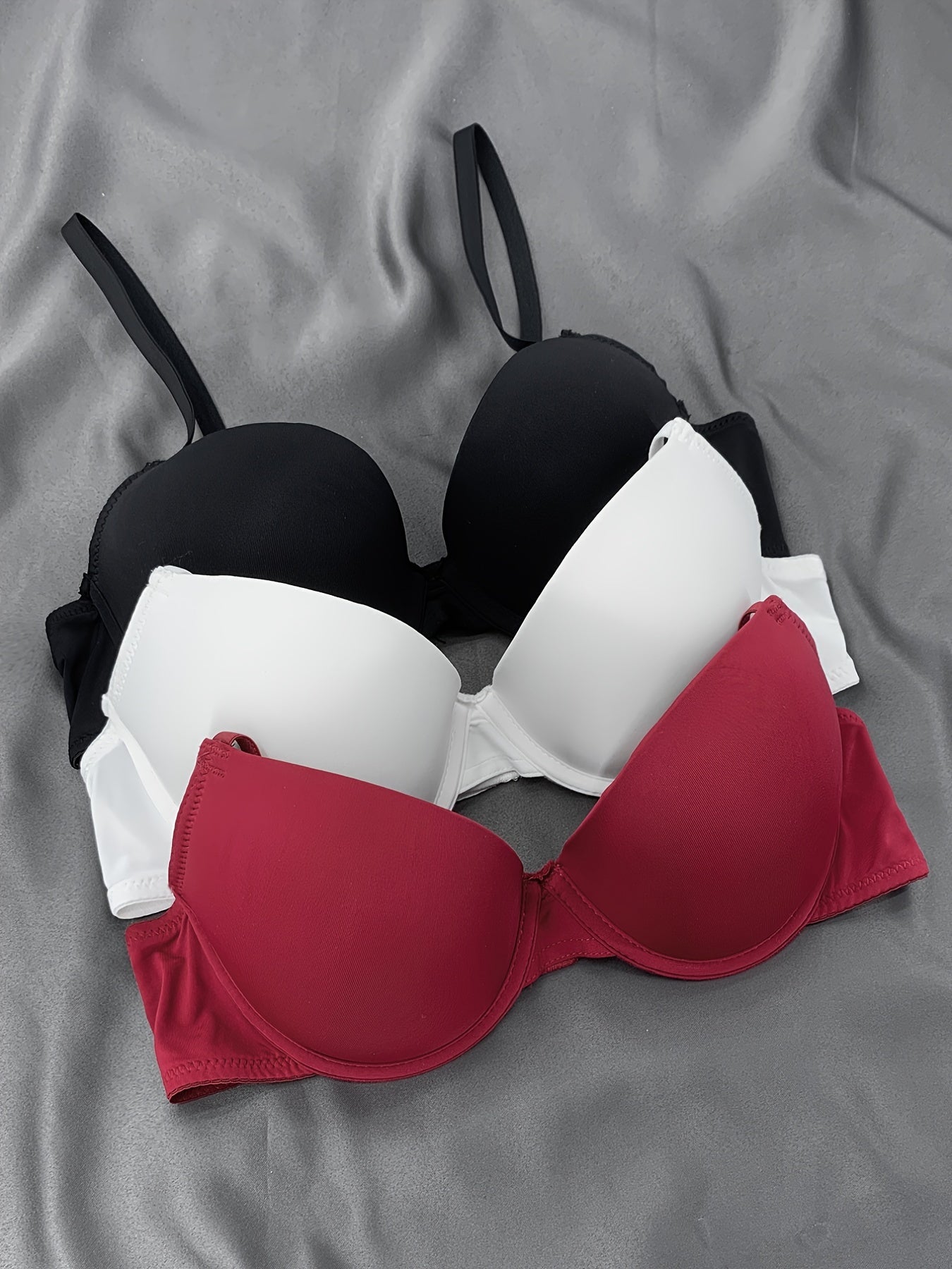 Women's shapewear bra set with shaping and gathering.