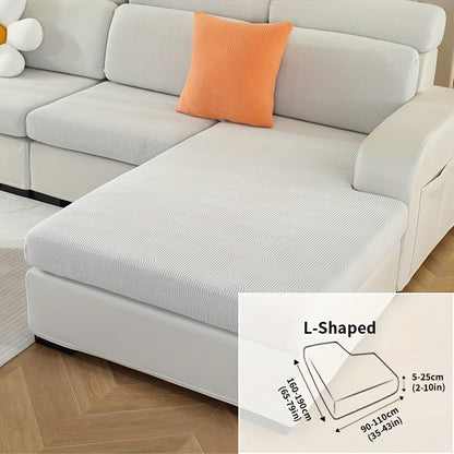 Jacquard sofa slipcover with universal fit and elastic design for furniture protection and home decor in any room.