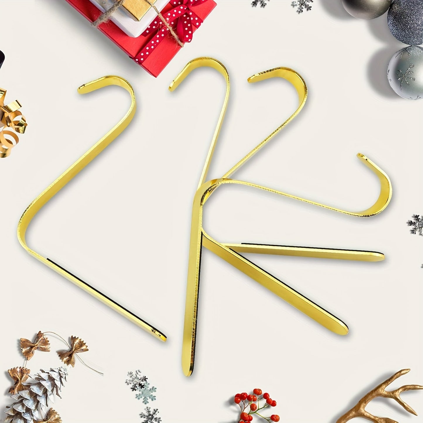 Golden Christmas Stocking Holder made of metal with a long hook, featuring anti-slip design, perfect for hanging stockings on fireplace cover.