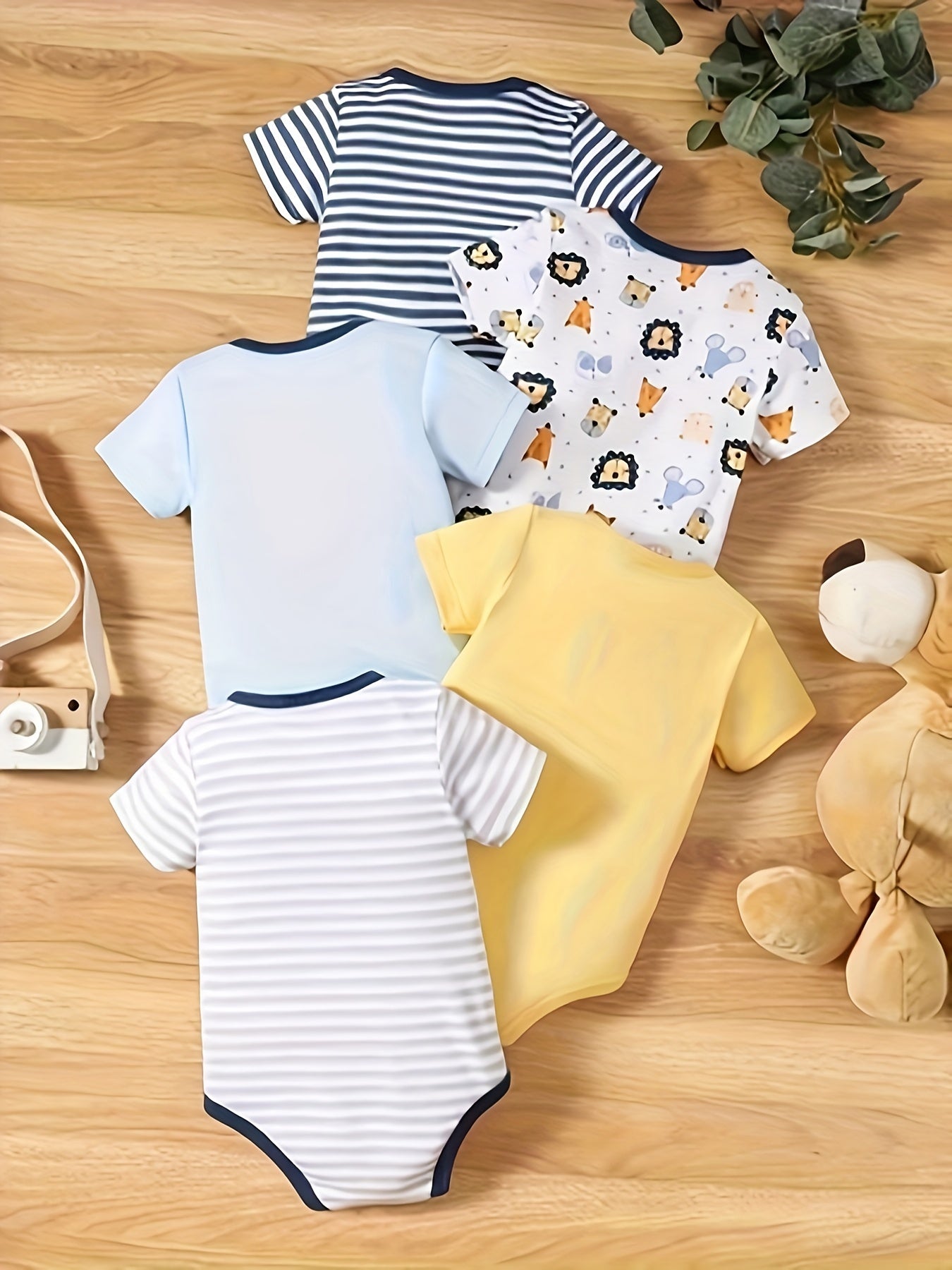 5 Baby boys jumpsuits with cartoon lion and stripe pattern, short sleeves, made of 100% cotton for outdoor activities.