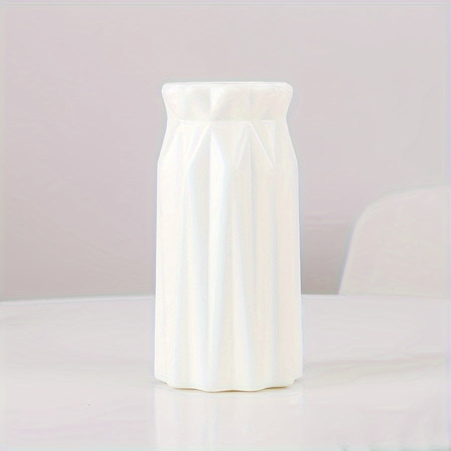 Contemporary Nordic-style plastic vase with ceramic appearance, ideal for home decor and dining. Great for artistic party accents.