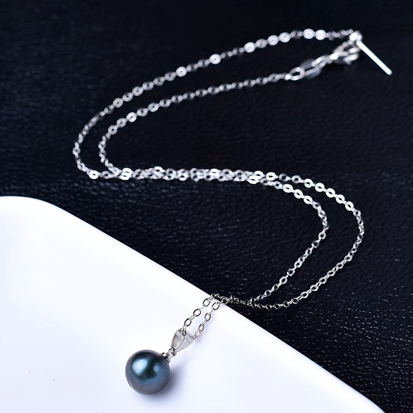 A stunning black pearl pendant necklace in elegant Bohemian style, crafted from S925 Sterling Silver and featuring a lustrous freshwater pearl. Perfect for everyday wear or as a thoughtful gift for a special woman.