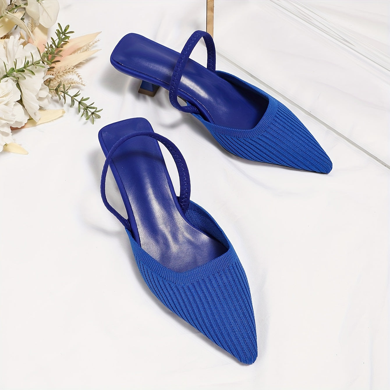 Solid color knit mules for women with flared heel and slingback style, featuring a trendy point toe design for comfort.