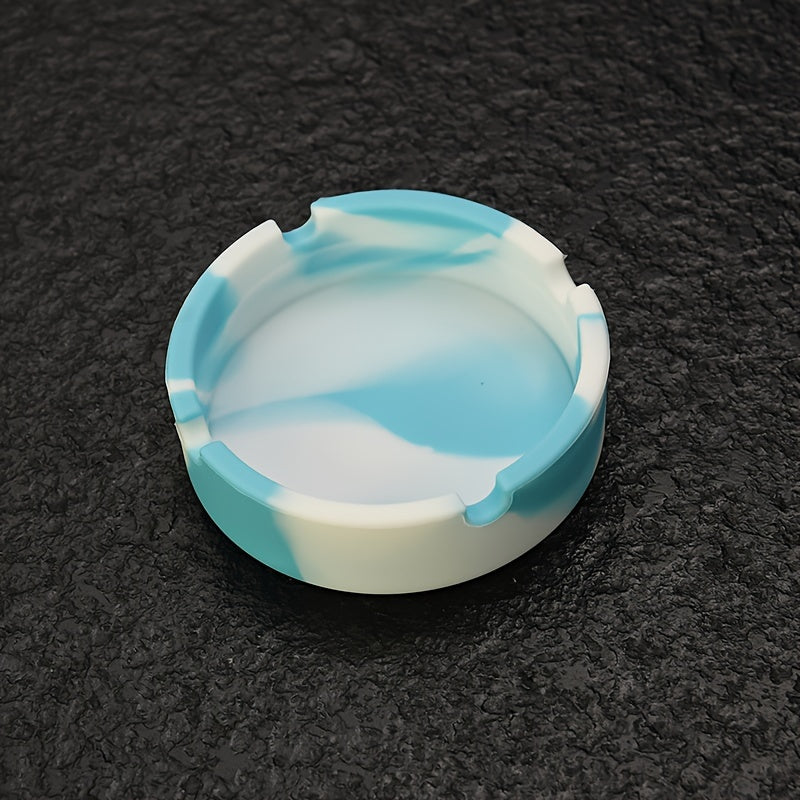 Round silicone ashtray for home or office use, suitable as a gift.