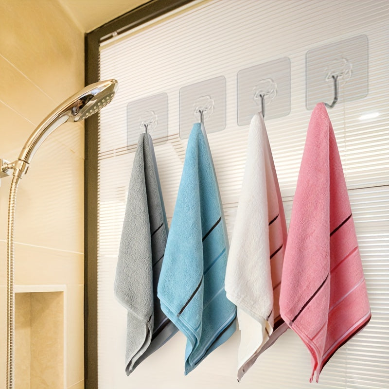 10 transparent adhesive hooks for hanging items on walls without leaving any marks or holes. Waterproof and suitable for use in bathrooms and toilets.