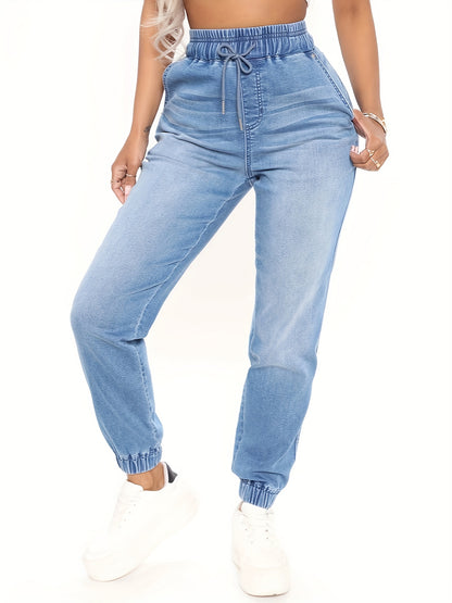 Women's plus size drawstring jogger jeans in a solid color with elastic waist, medium stretch denim made of 65% viscose, 20% polyester, 14% nylon, and 1% spandex, perfect for casual weekend