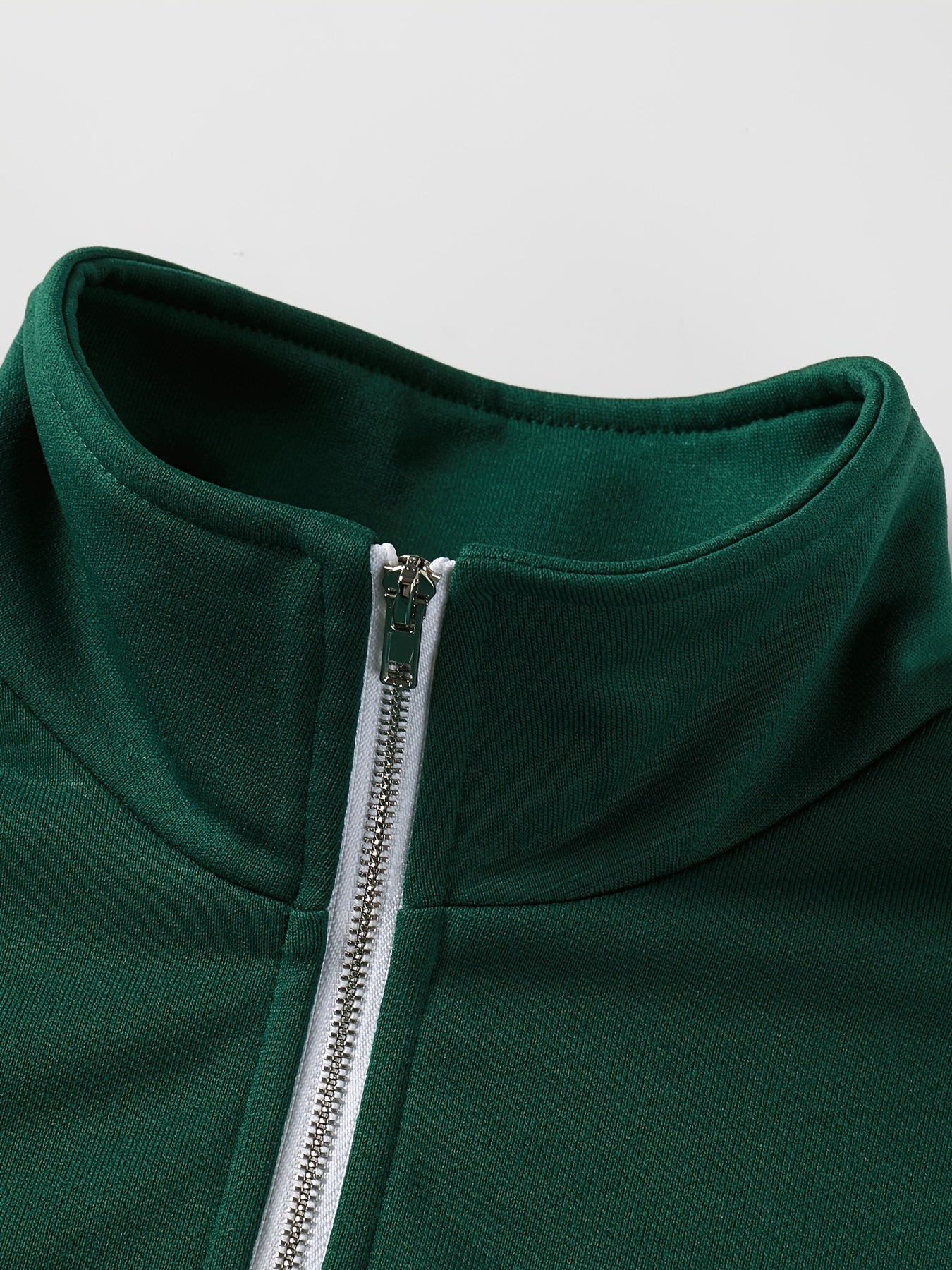 Men's casual zip neck sweatshirt made from 100% polyester, featuring embroidered long sleeves. Comfortable, soft, and slightly stretchy with a loose fit for spring/autumn fashion.