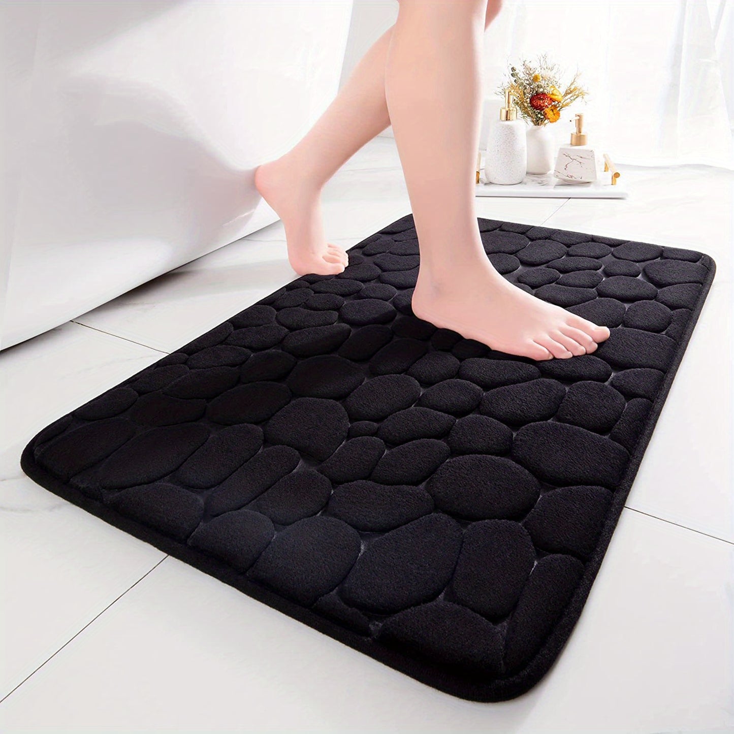 Soft, memory foam bath rug with cobblestone embossment. Rapid water absorbent, non-slip, and washable. Ideal for shower rooms, bathrooms, kitchens, bedrooms, and as decorative accessories.