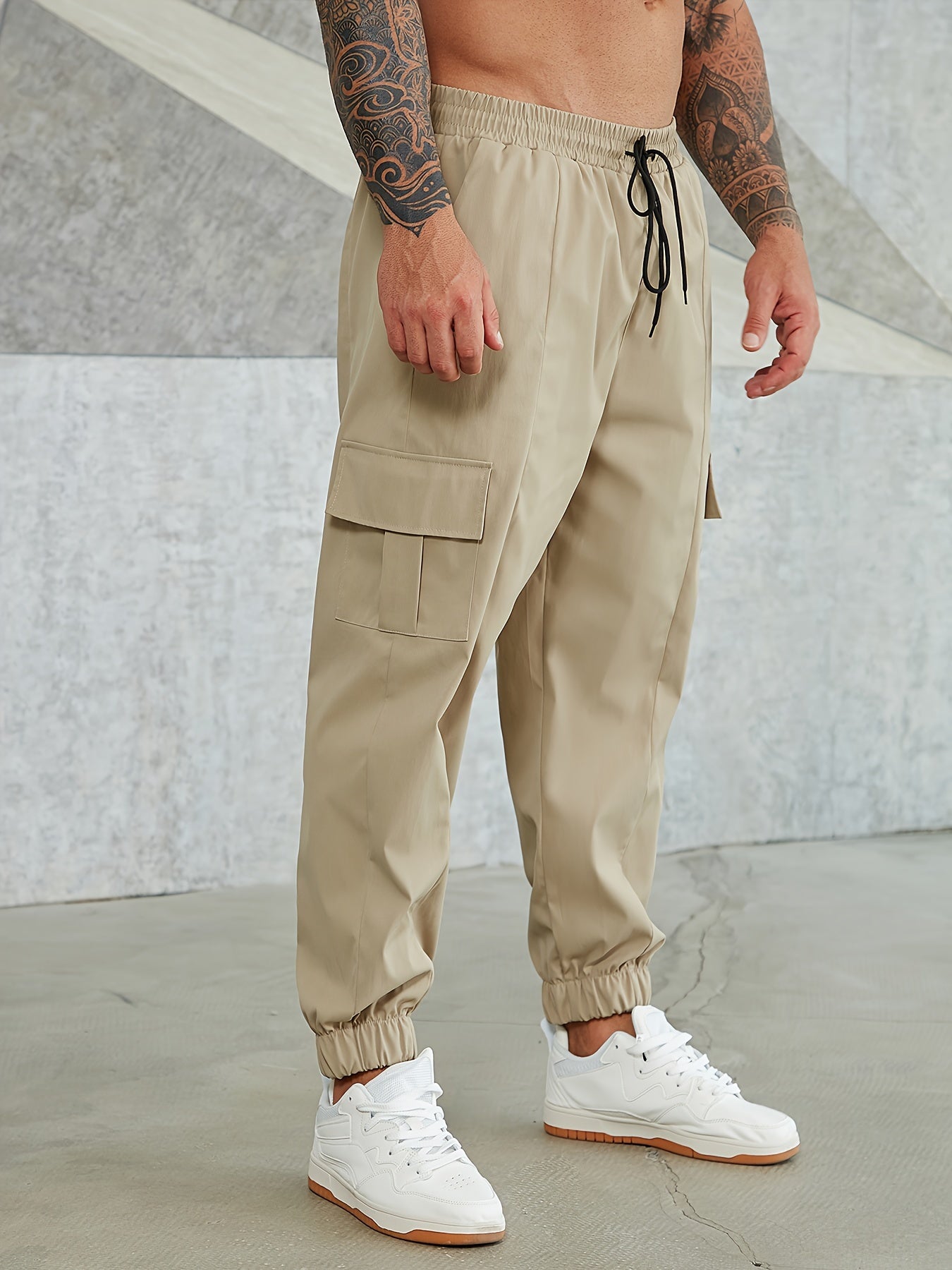 Solid cargo pants for plus size men, ideal for sports and outdoor activities.