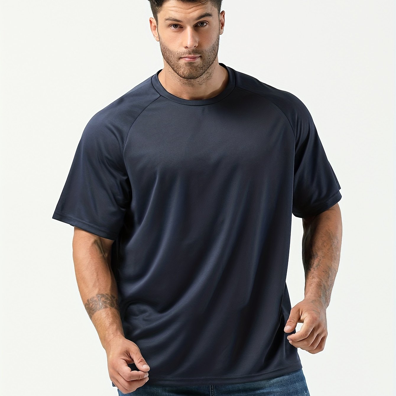 Plus-size men's moisture-wicking short-sleeve T-shirt for casual sports.