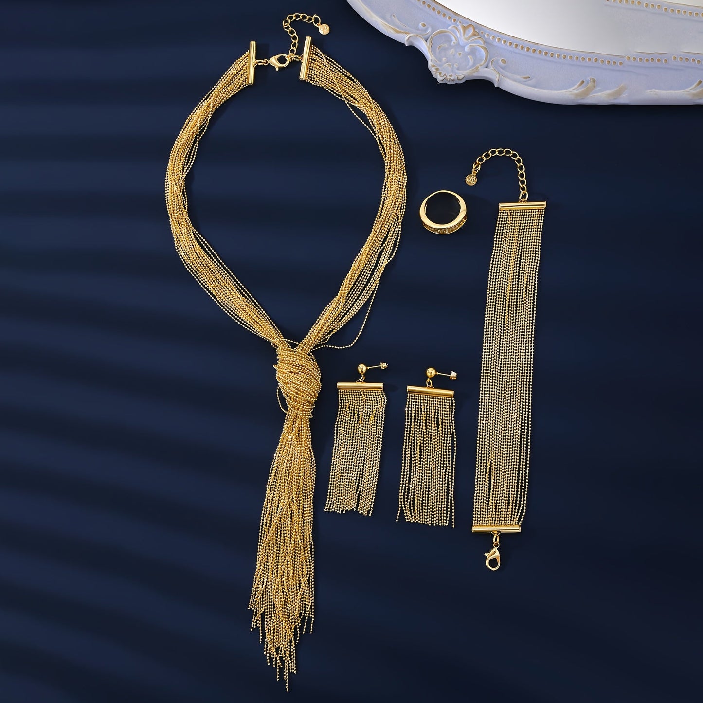 Experience the Exquisite MEIZ Luxury Hip-Hop Style Jewelry Set, featuring 18K Golden Plated Copper with Hollow Tassel Earrings, Tassel Necklace, Ring, and Bracelet. Perfect for Daily Wear or as Wedding Accessories, this Set is Ideal for Gift-Giving and