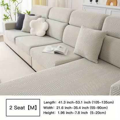 Waterproof sofa cover with elastic stretch and jacquard argyle pattern for home or office decor.